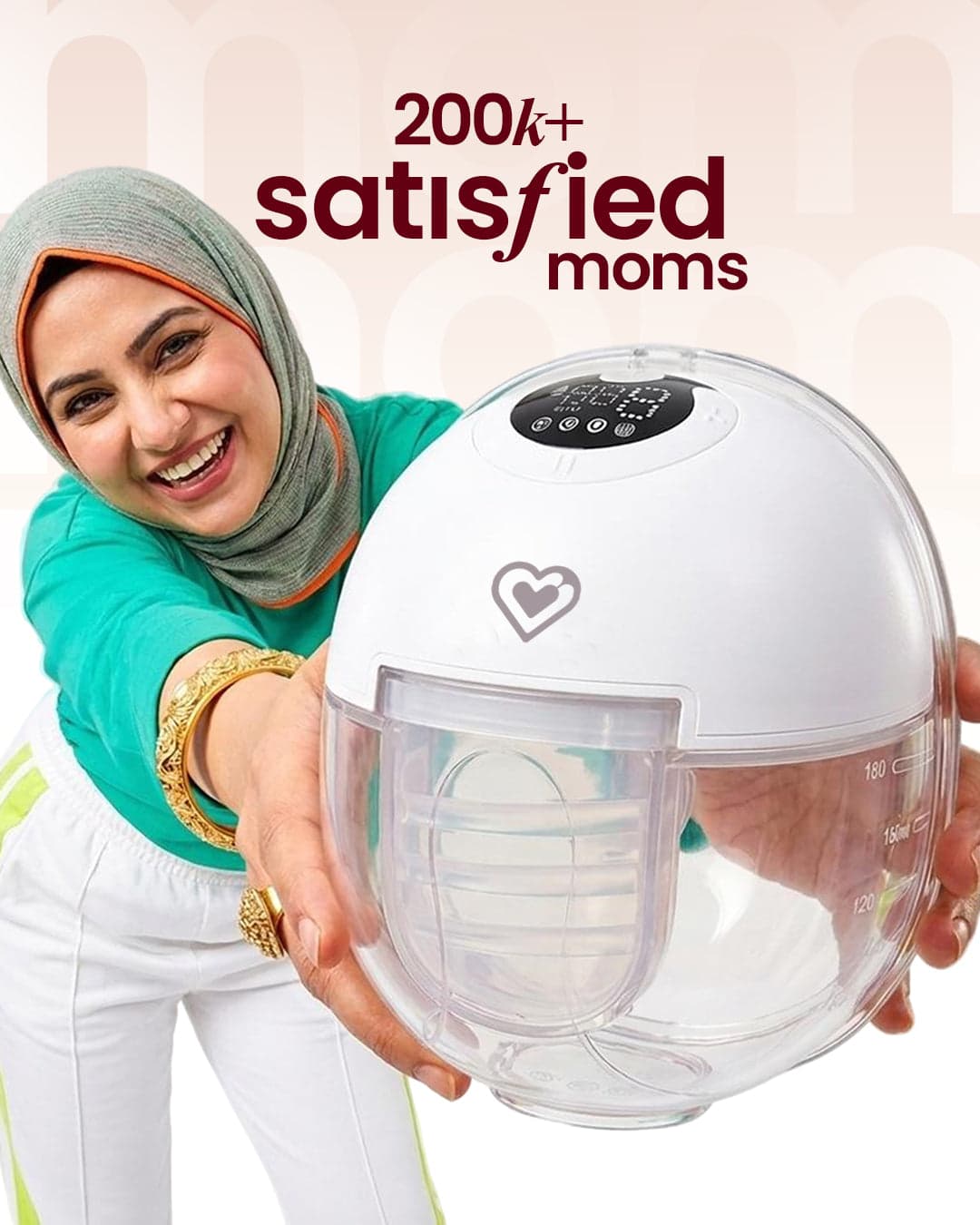 Mother holding the MomSolutions wearable pump